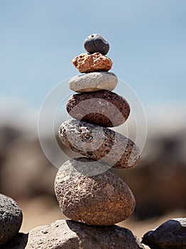 Stack of volcanic stones on the beach