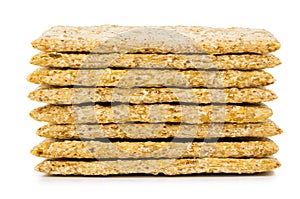 Stack of wheat crispbreads isolated on white