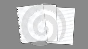 Stack of white blank, lined, math note, notebook paper are on dark grey background for text, advertising or design