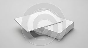 Stack of white blank paper sheets on gray background