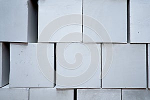 Stack of white cement brick