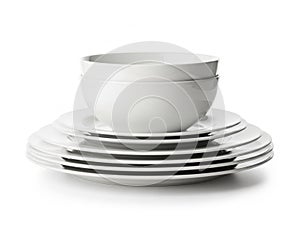 Stack of white ceramic dishes isolated on white background