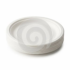 Stack of white disposable paper plates on white background