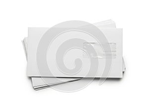 Stack of white envelopes isolated on white background