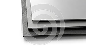 Stack of white and gray paper sheets isolated on white background