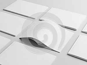 Stack of white notepads isolated on white background