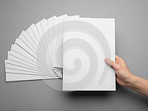 Stack of white paper sheets isolated on white background