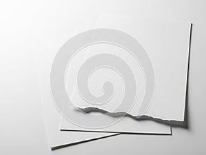 Stack of white paper sheets isolated on white background