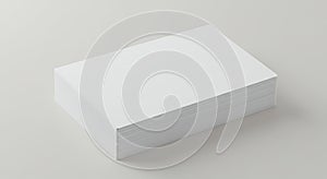 Stack of White Paper Sheets on Light Gray Surface