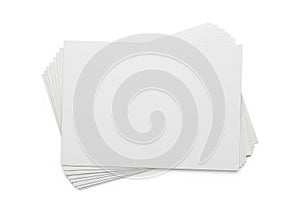 Stack of white paper sheets on a plain white background for office or school use