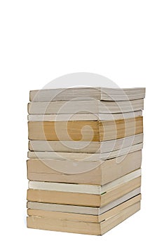 Stack of white paperback books isolated on white with copyspace