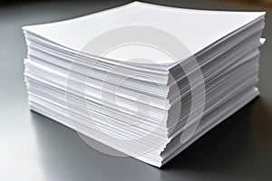 stack of white papers ready for printing flyers