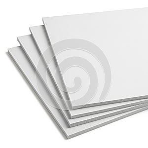 Stack of white papers or sheets on white background with subtle shadows