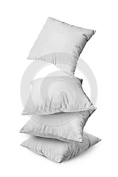Stack of white pillows isolated on white background