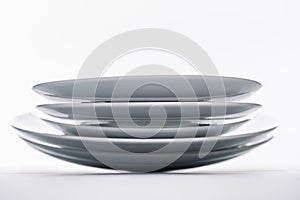 Stack of white porcelain plates