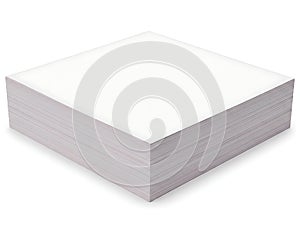 Stack of white printer paper on desk
