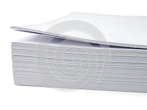 Stack of white printer paper sheets on white background