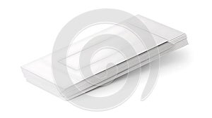 A stack of white, rectangular envelopes lies on a flat surface. The envelopes are