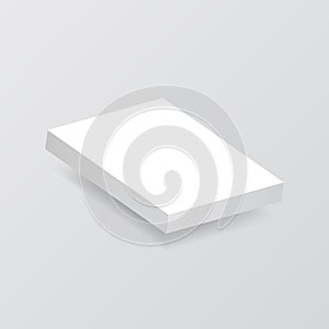 Stack of white sheets of paper on a gray background .