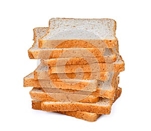 Stack of whole wheat bread slice on white