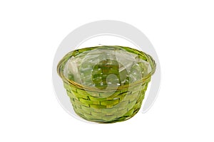 Stack of wicker straw osier handmade baskets different size and pattern at isolated white background for home storage. A set of