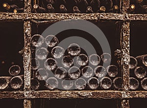 Stack of wine bottles in cellar