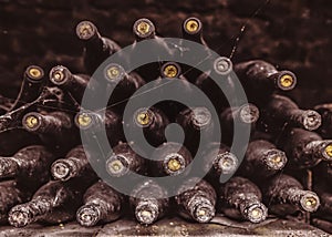 Stack of wine bottles in cellar