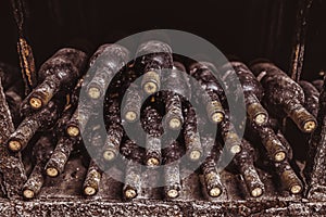 Stack of wine bottles in cellar