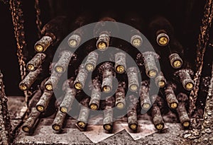 Stack of wine bottles in cellar