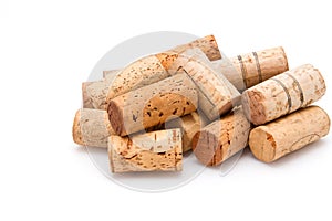 Stack of wine corks on white