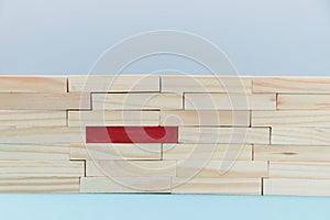 Stack of wood blocks with one red plank. Personal identity mockup. Stand out from crowd. Not like everyone. Uniqueness