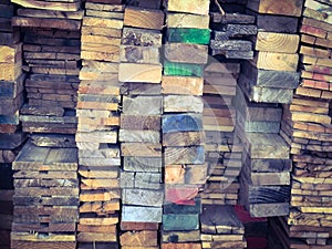 Stack of wood with colorful ends background texture