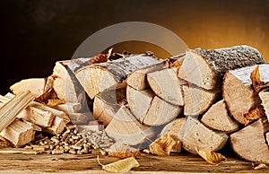 Stack of wood logs sitting on top of table