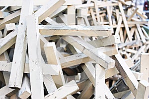 Stack of wooden bars.Wall of horizontal wooden bars, background. Beautiful and varied theme. abstract composition of