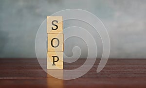 Stack wooden cube with text SOP