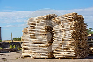 Stack of Wooden Fence Posts