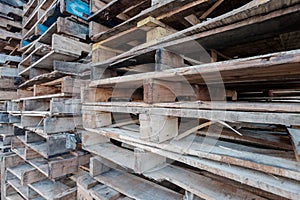 Stack of Wooden Pallets sitting on a working dock ready for outbound lobster shipments via truck and airplane