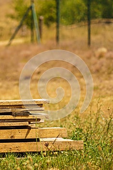 Stack of wooden piles plank boards