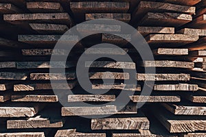 Stack of wooden planks solid-sawn timber construction material