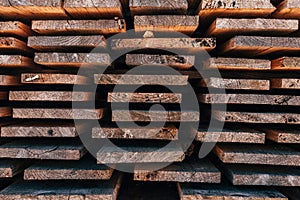 Stack of wooden planks solid-sawn timber construction material