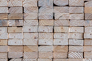 Stack of 2x4 studs in a lumber yard