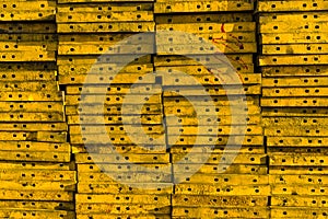 Stack of the yellow concrete formwork steel.