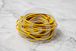Stack of yellow rubber bands