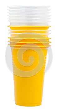 Stack of yellow and transparent plastic cups