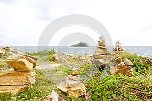 Stack of zen stones in balance at seashore