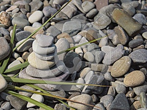 A stack of Zen stones, a close-up of pebbles stacked on top of each other, top view