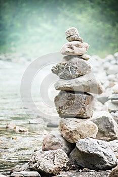 Stack of zen stones on nature background, concept of balance and harmony