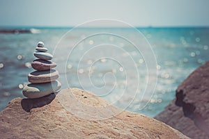 Stack of zen stones near sea. Harmony, balance