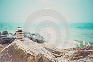 Stack of zen stones near sea. Harmony, balance