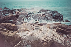 Stack of zen stones near sea. Harmony, balance